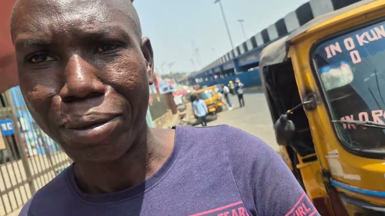 Asking Nigerians questions at Mokola Market Ibadan 