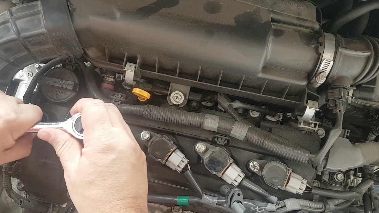 cambiando bujias al Suzuki Ignis