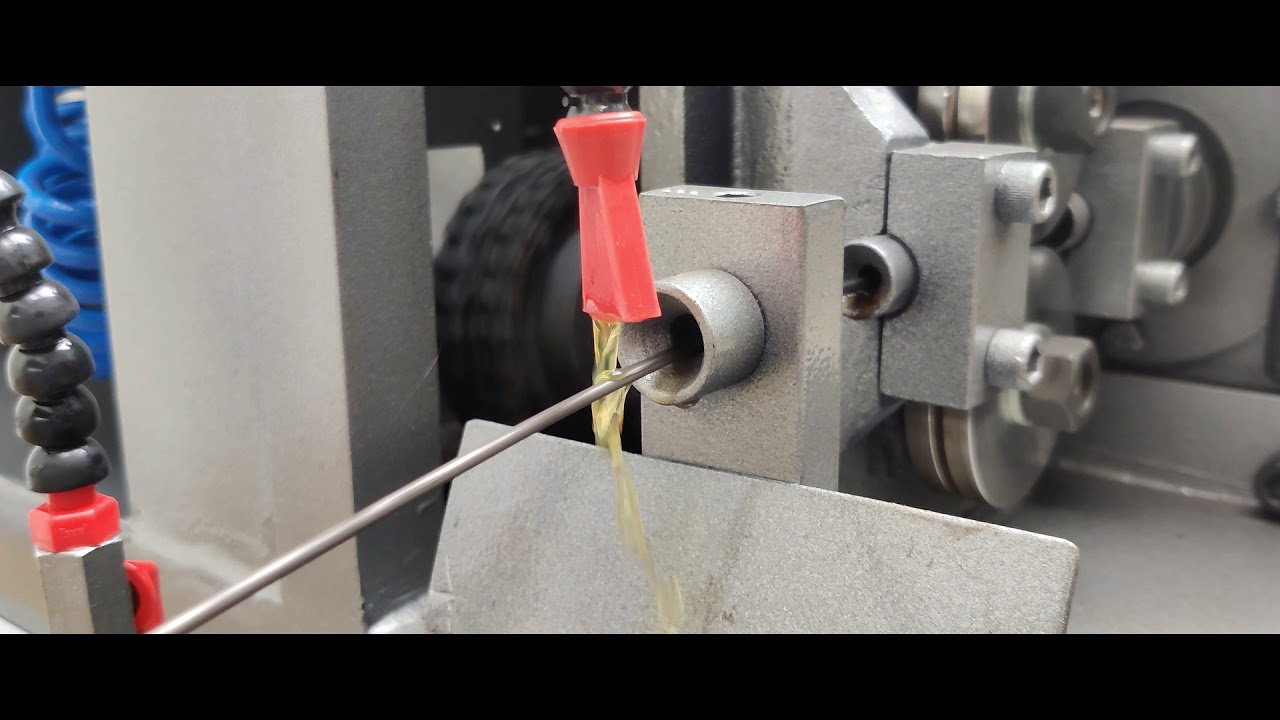 Wire straightening and cutting machine
