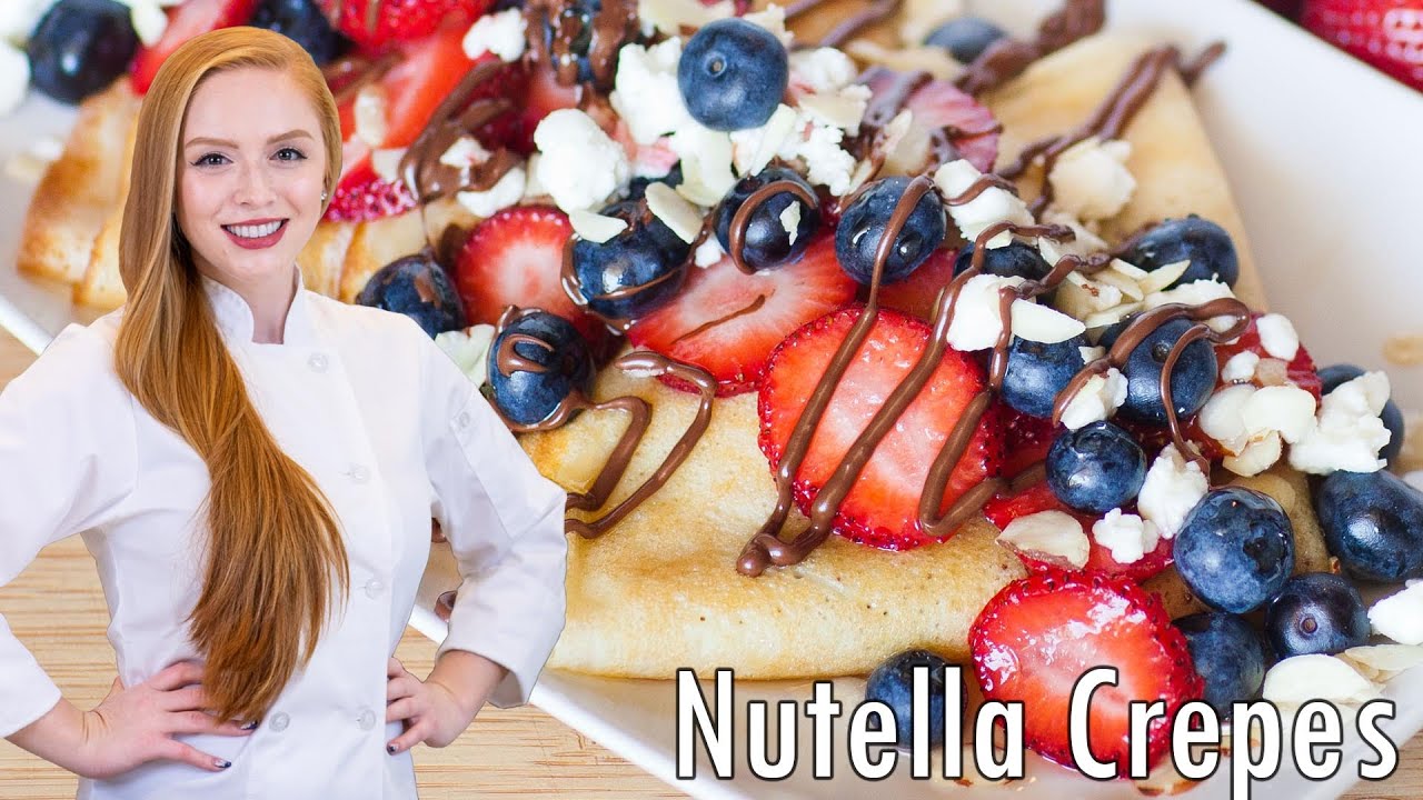 Nutella-Stuffed Crepes - AMAZING Breakfast Recipe!! With berries, almonds and syrup!