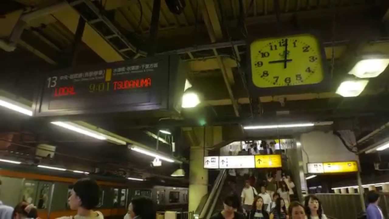 tokyo japan shinjuku station  let's see trains how they're keeping time precisely on