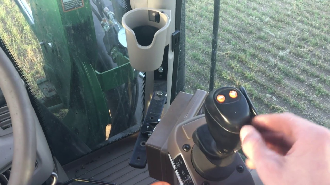 John Deere 6150r and moving bales