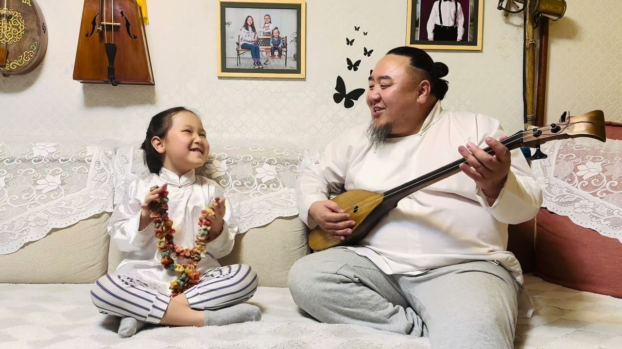 My son Hangal is singing with me.
