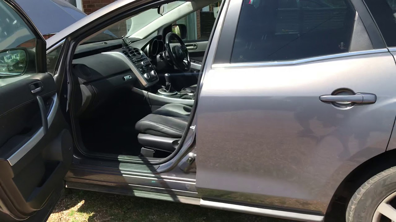 Mazda CX-7 footwell wet air-con drain