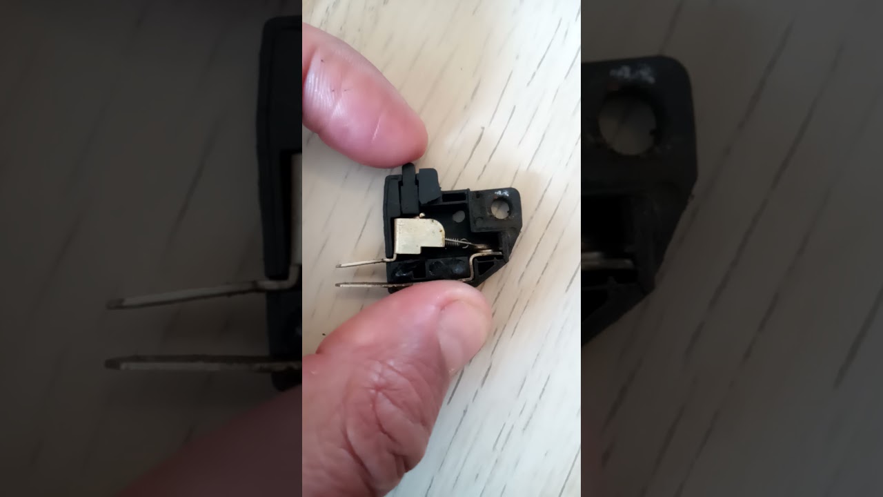 internals of brake light switch click