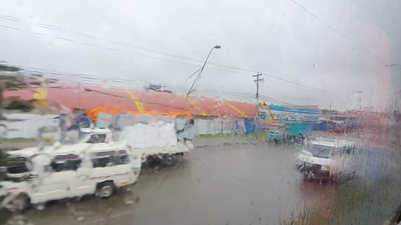 Viaje Oruro - La Paz,  Llegando a la ciudad de El Alto en un día lluvioso