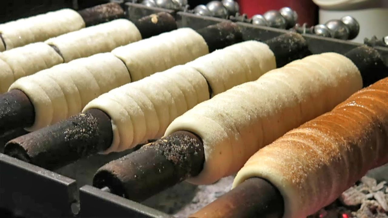 Street Food of Prague, Czech Republic. The Trdeln&iacute;k Sweet Pastry from Slovakia