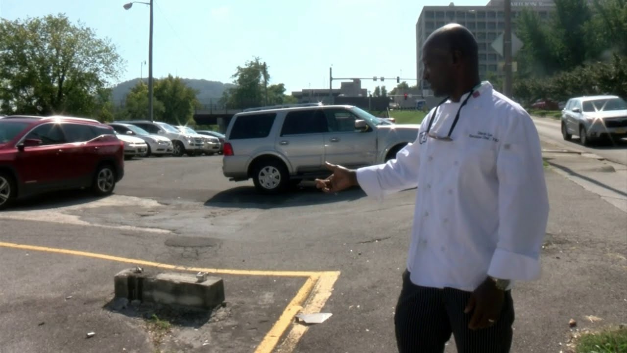 Car damaged when it strikes concrete block in Roanoke public parking lot