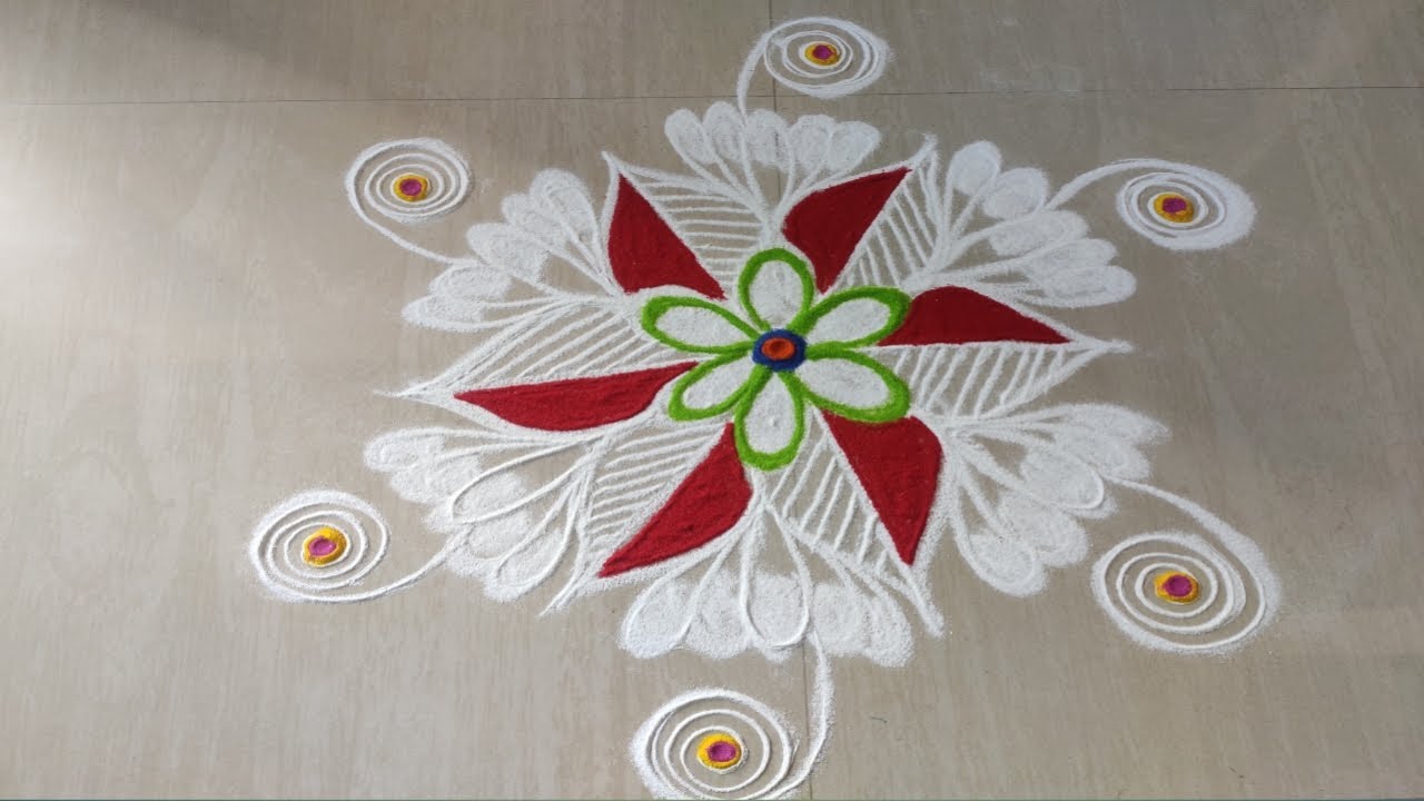 Easy and simple rangoli with dots 3 to 2...simple rangoli by lochini