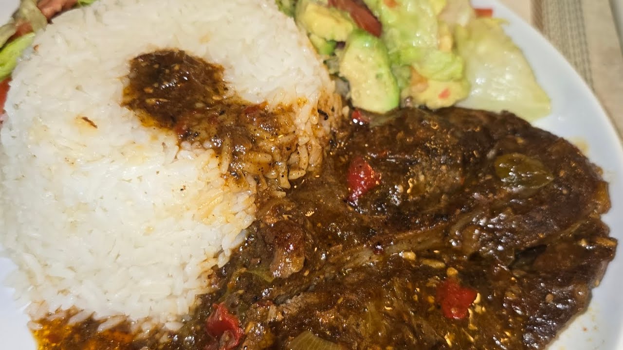 Jerk steak pork with rice n vegetables delicious guys 