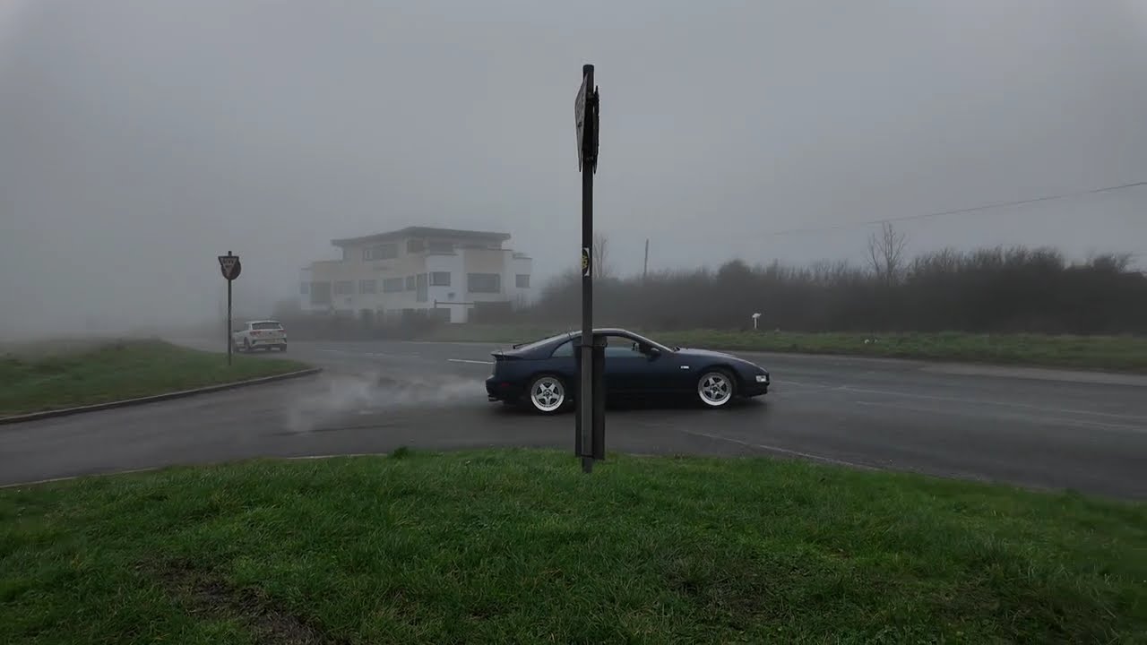 Cars Leaving Portsdown Hill Into The Mist !