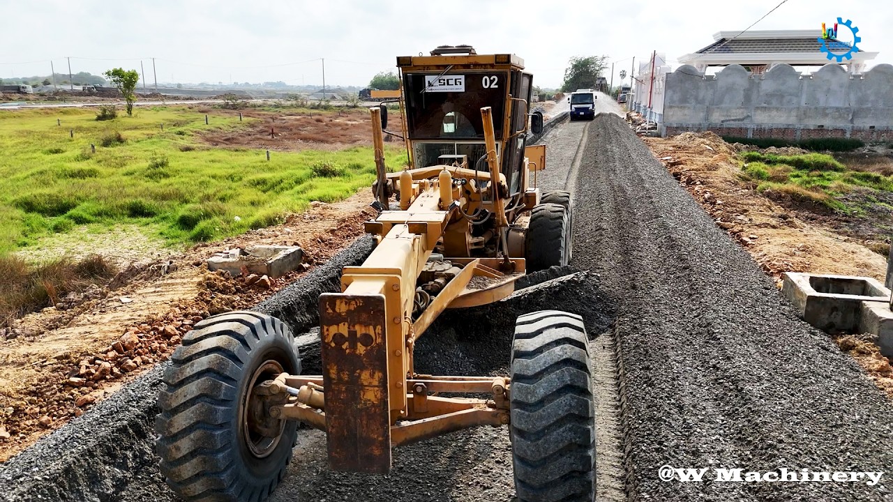 Wonderful Heavy Komatsu Motor Grader Spreading Gravel Installing Foundation Village Roads Operator