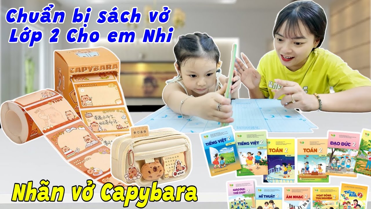 Em Nhi Chuẩn Bị Sách Vở Để Lên Lớp 2