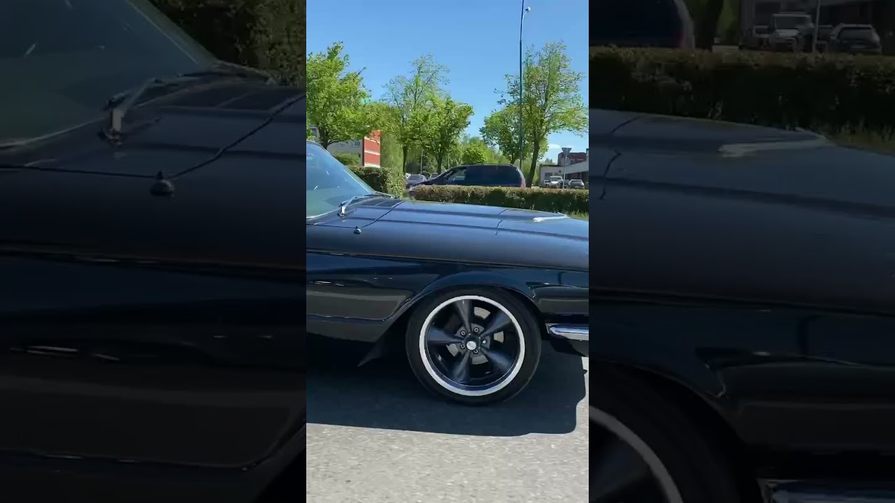 Ford ThunderBird 1966 cruising on sunny day