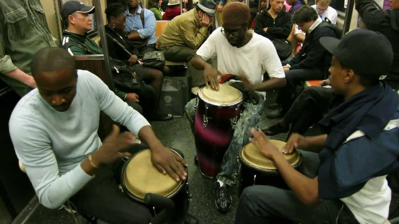 A Slice of NYC Life: Conga drum trio playing on the A train