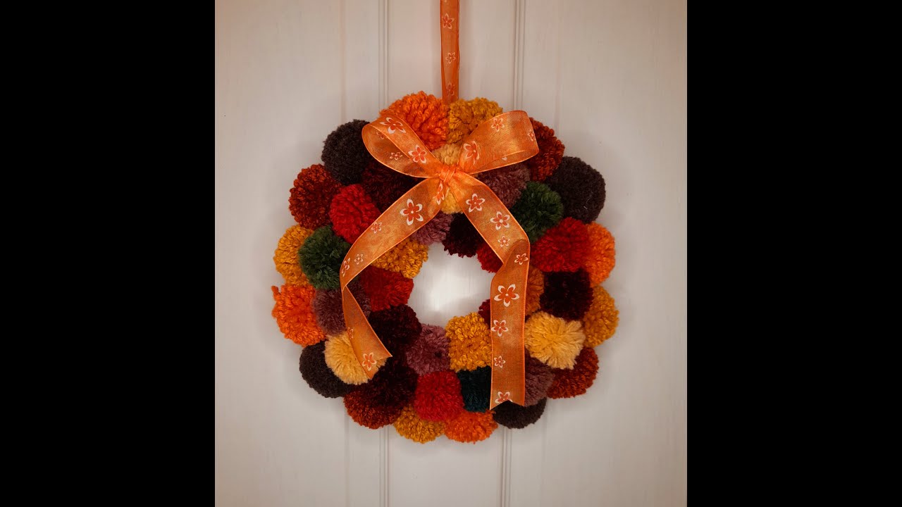 Making pompoms for an autumn pompom wreath