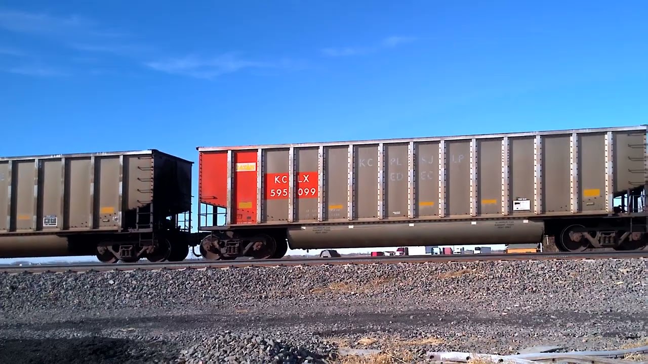 UP 7806 leading empty coal train west of Gibbon 