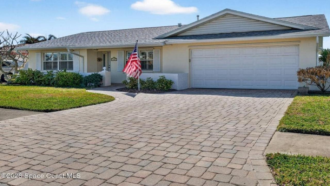 448 Saint Georges Court, Satellite Beach, FL Presented by The Frommann Team Paul & Beth