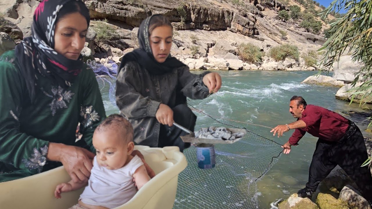 The real lifeofnomadsinthe heartofnaturetraditional child bathingfatherfishingand cooking withfire🔥🌿