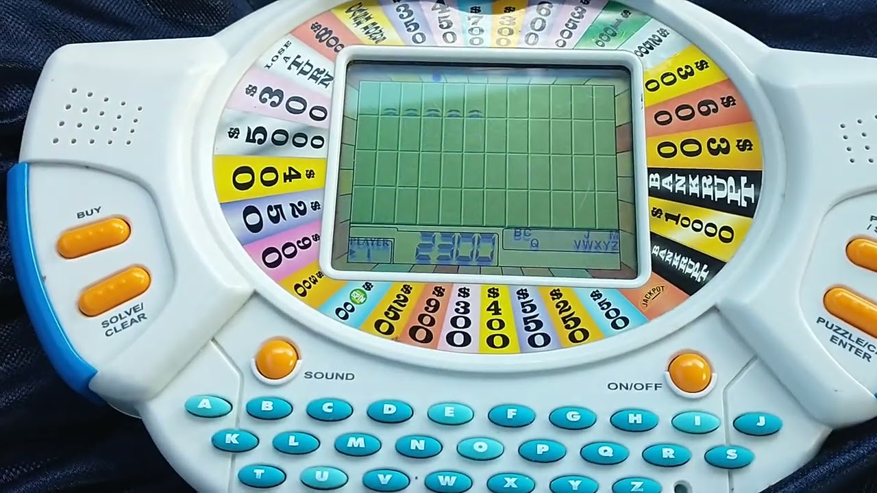 Wheel of Fortune Deluxe Electronic Game #1