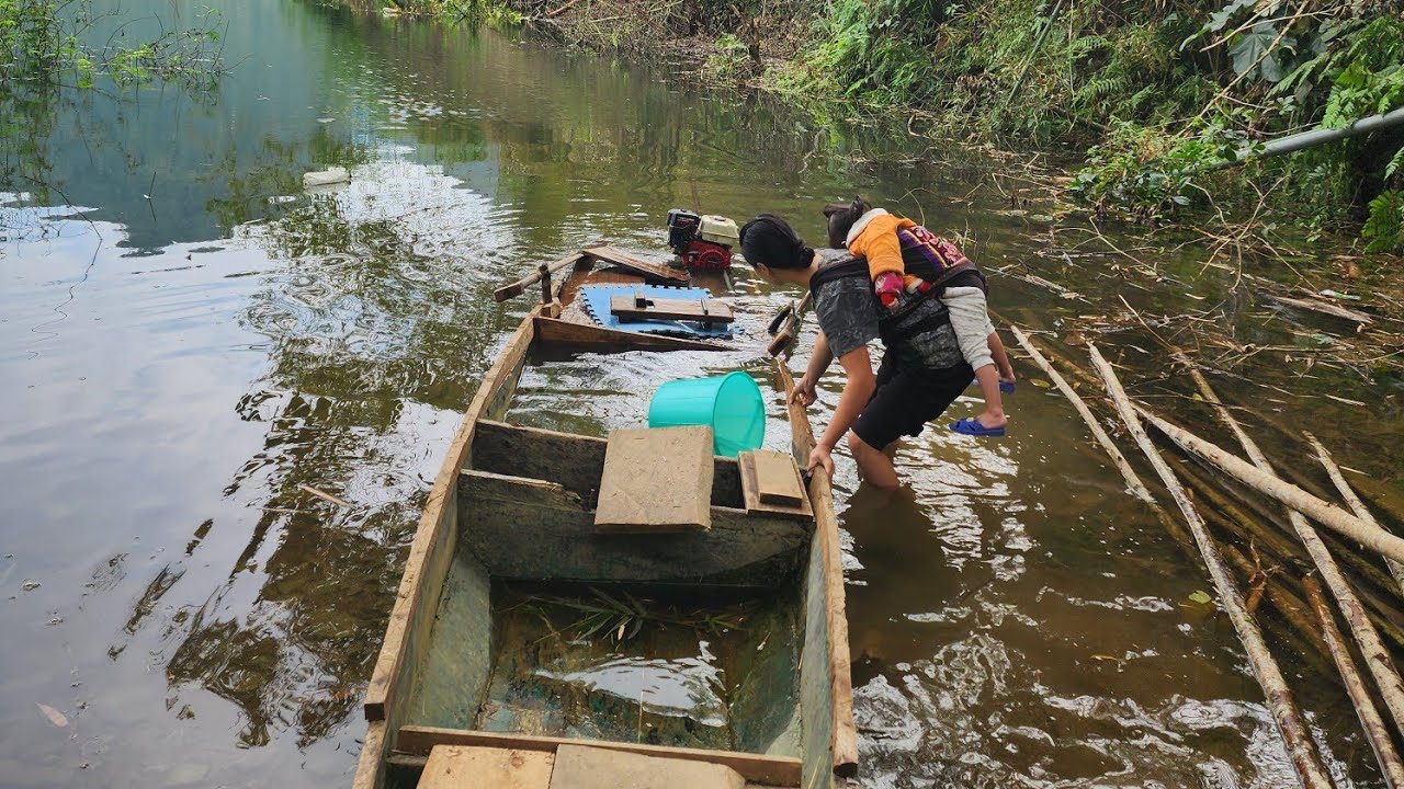 It was raining heavily, and the mother and her two children had no boat to go out in.