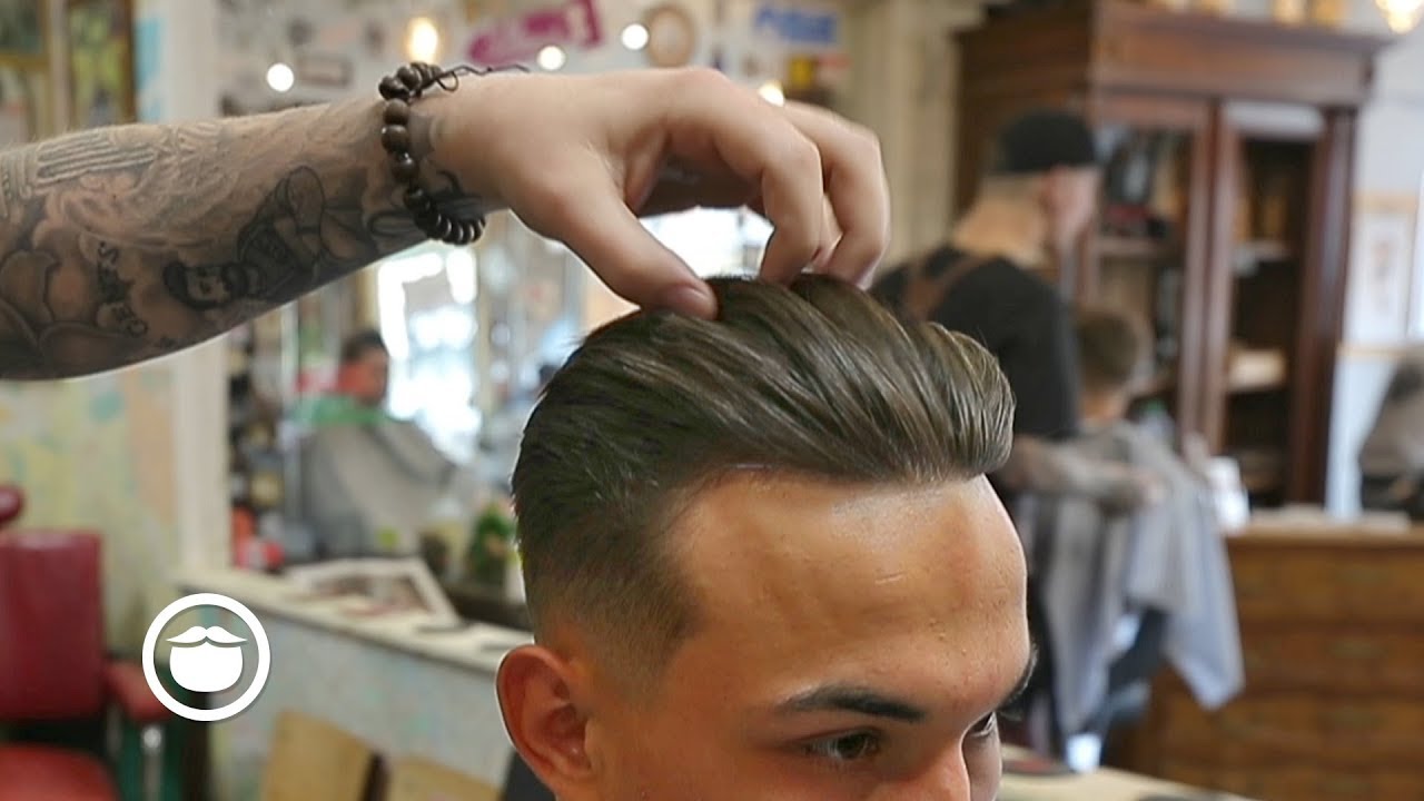 Combed Back Haircut with Middle Part