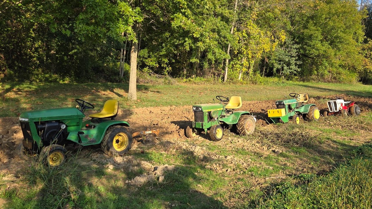 plowing with John deere 214, 140s, and sears garden tractors. John Deere A, Allis Chalmers WC and WD