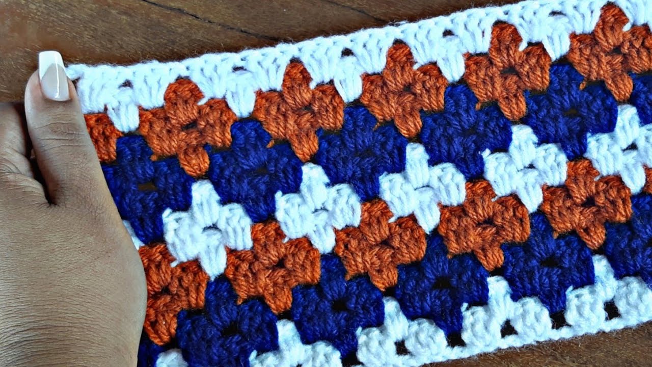 ponto de croche, com formato de diamante,  a combinação perfeita das cores