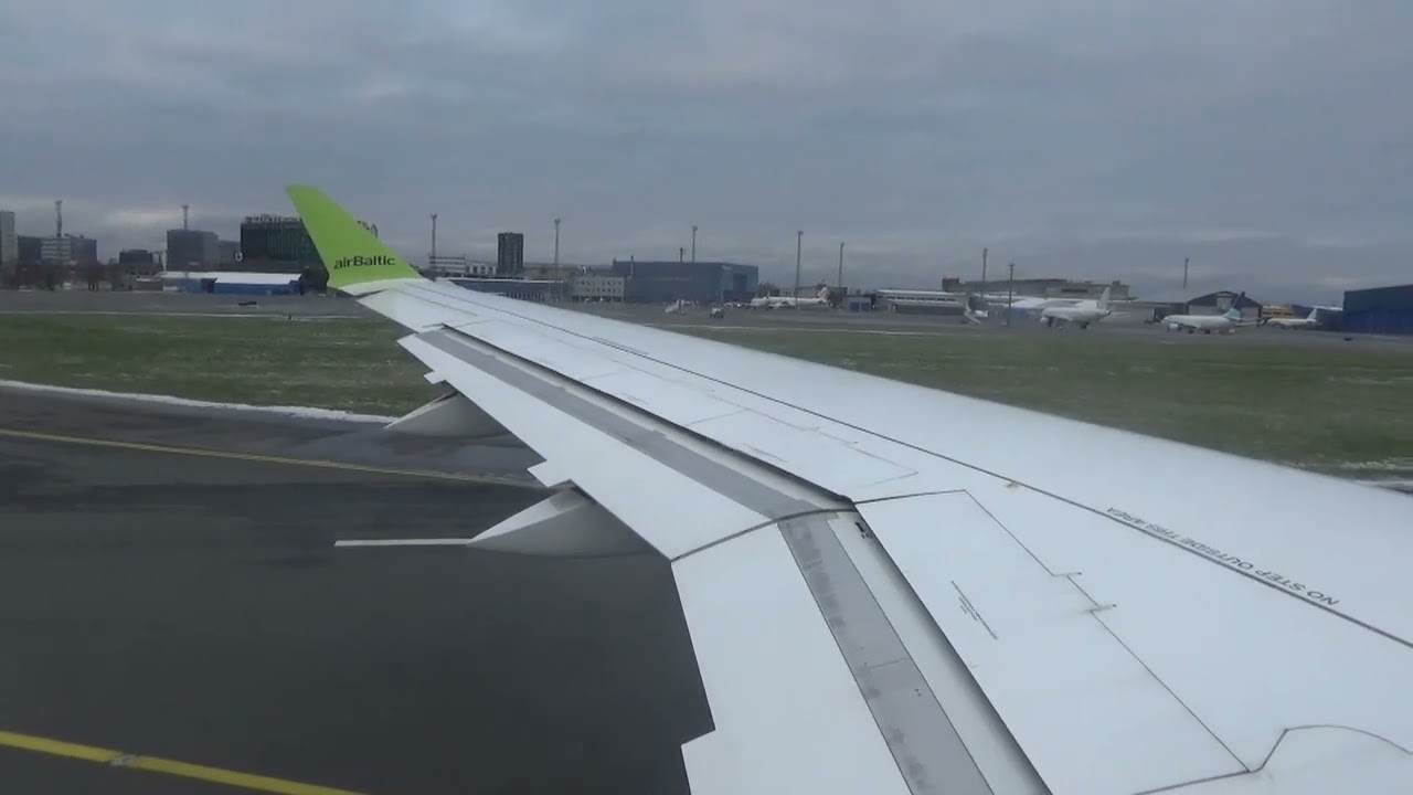 Air Baltic taking off at Tallinn airport on 29th October 2023.