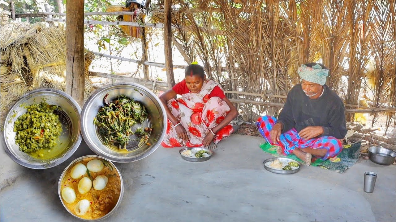 Santali tribe poor family cooking and eating Egg vapa, shak vaji and karela vorta