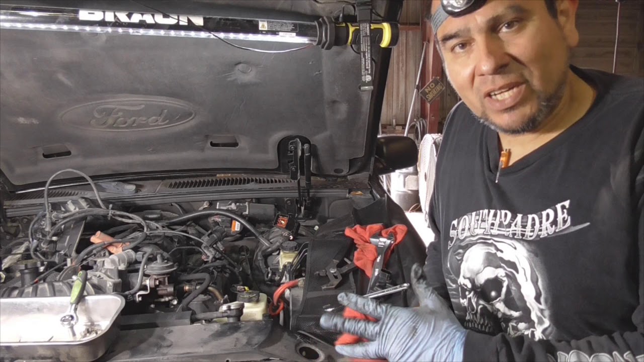 2005 SPORT TRAC 4 0L VALVE COVERS PT2