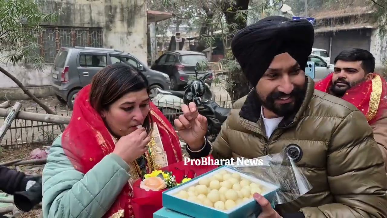 Journalist Mohander Jeet Singh felicitates Journalist Rushmi Sharma as her daughter, Captain Hansja