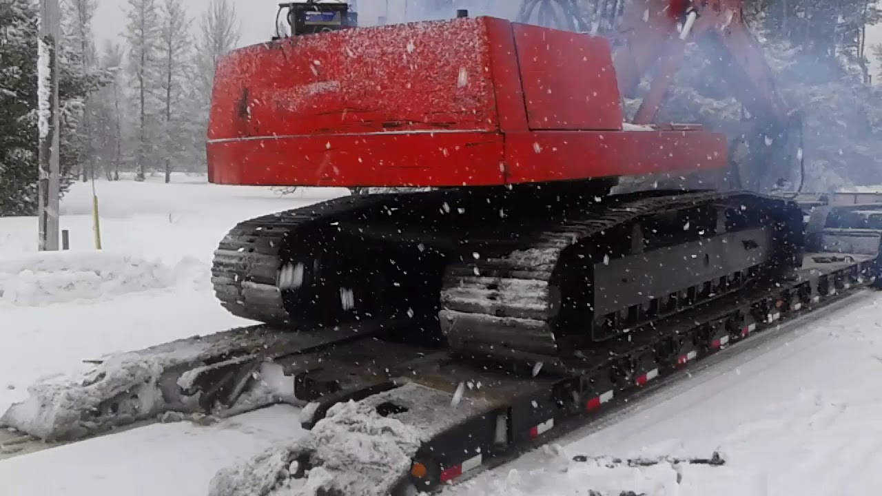 Unloading O&K RH6 Excavator