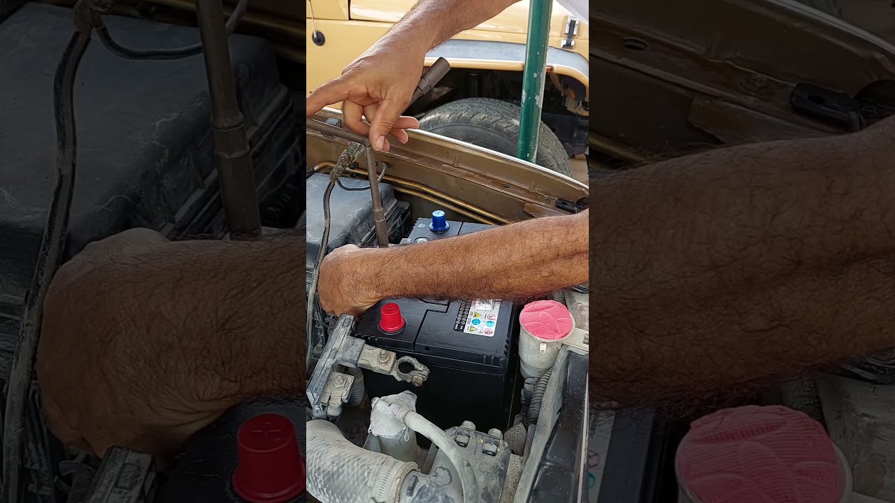 تركيب البطارية الجديدةلسيارة الإستيشن لاندكروزر(3)  Installing the new battery for the station wagon