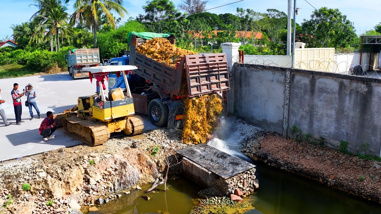 incredible full landfill delete drain project , truck transport soil stone bulldozer push soil stone