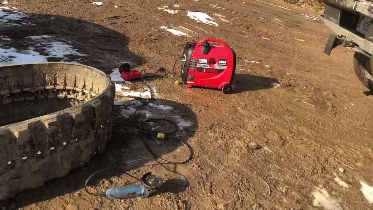 Trying to repair ripped rubber excavator track with chains, it didn’t work time for a new track