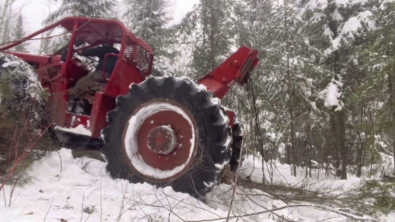 230 Timberjack plowing and getting firewood in the snow