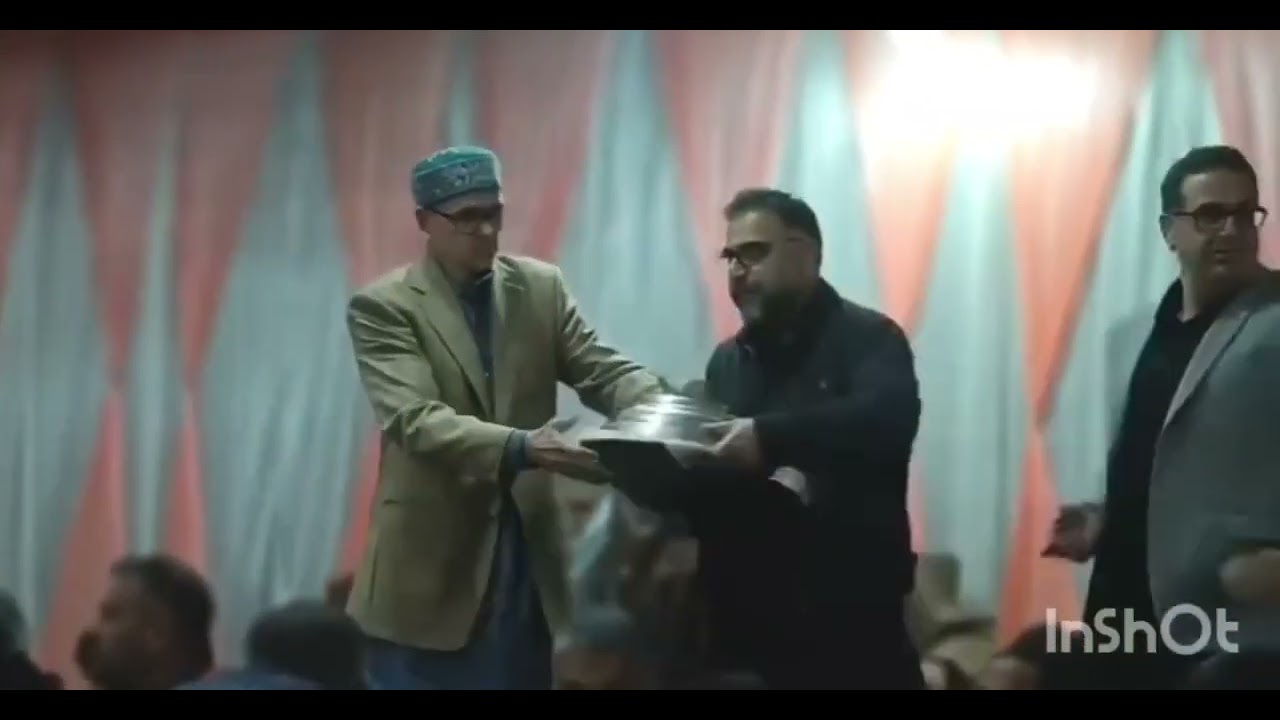Omar Abdullah and others serving dinner among Media persons during JKNC official Iftaar Party