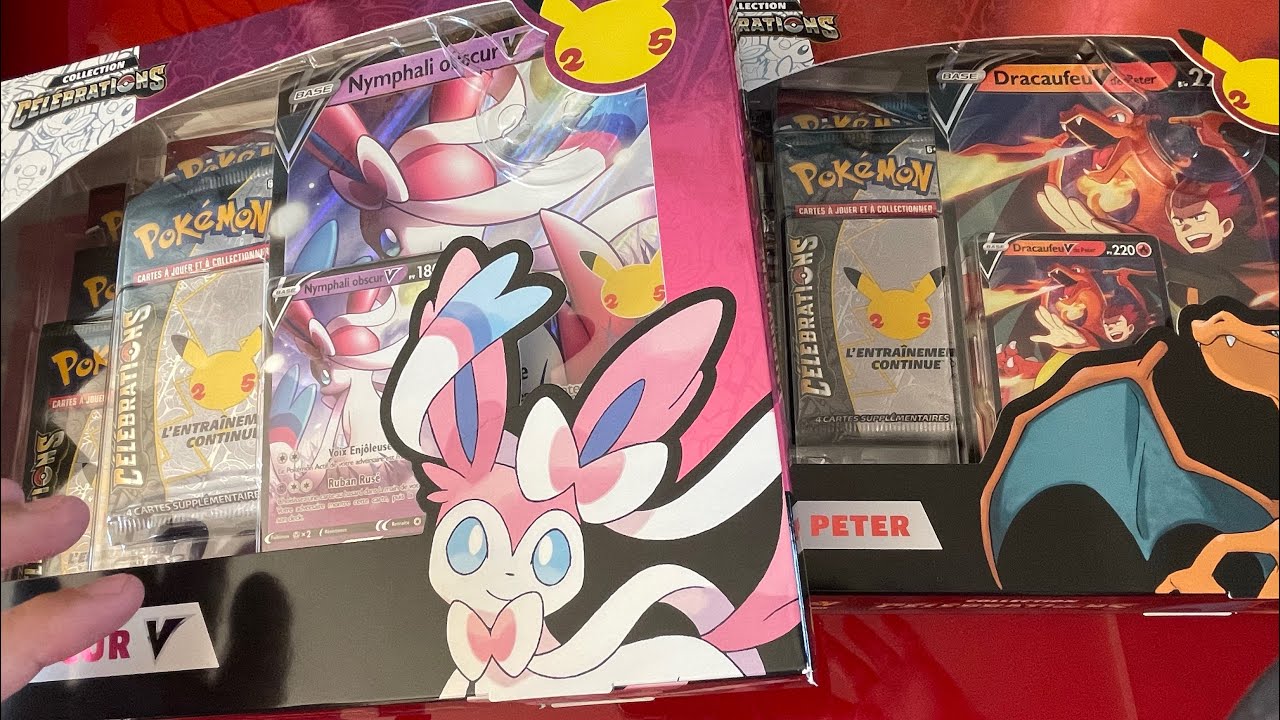 2 coffrets 25 ans Pokemon nymphalie et dracaufeu belle ouverture