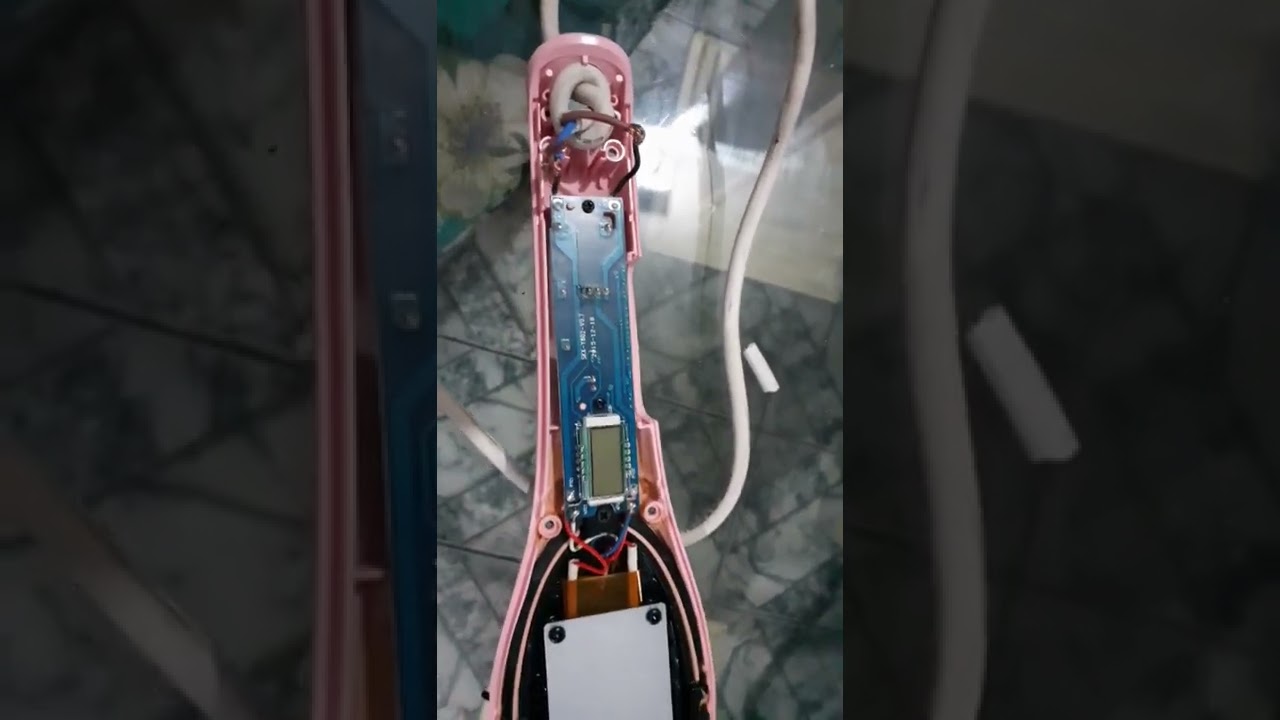 Como consertar escova alisadora m&aacute;gica rosa.