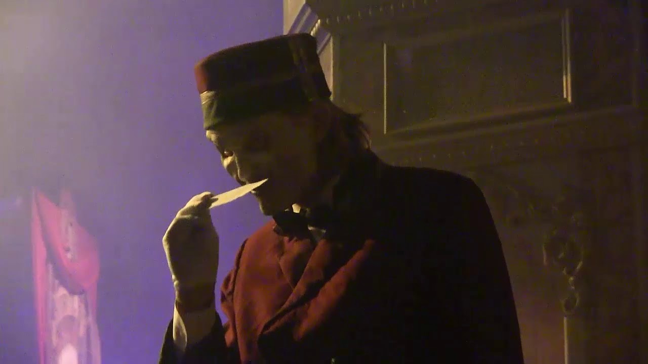 Giving the Usher a ticket at Halloween Horror Nights 25