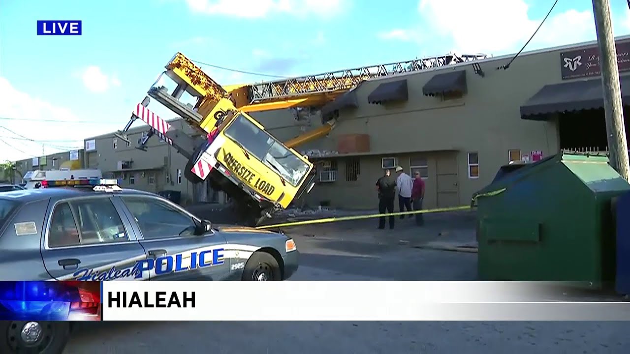 Crane collapses on warehouse in Hialeah