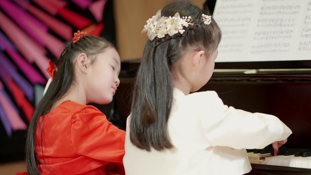 Melody and Isabelle play piano duet Czech Polka