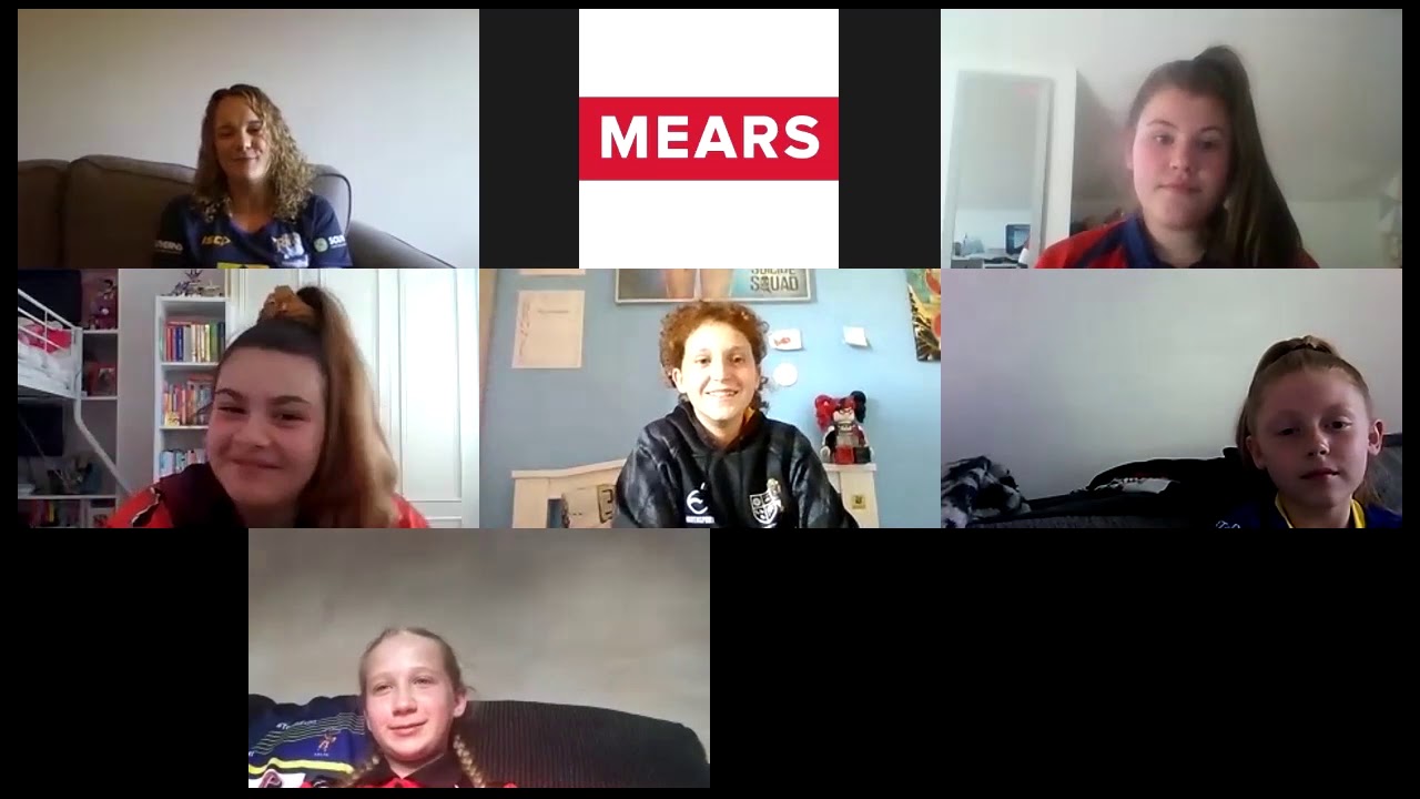Lois Forsell speaks with junior players