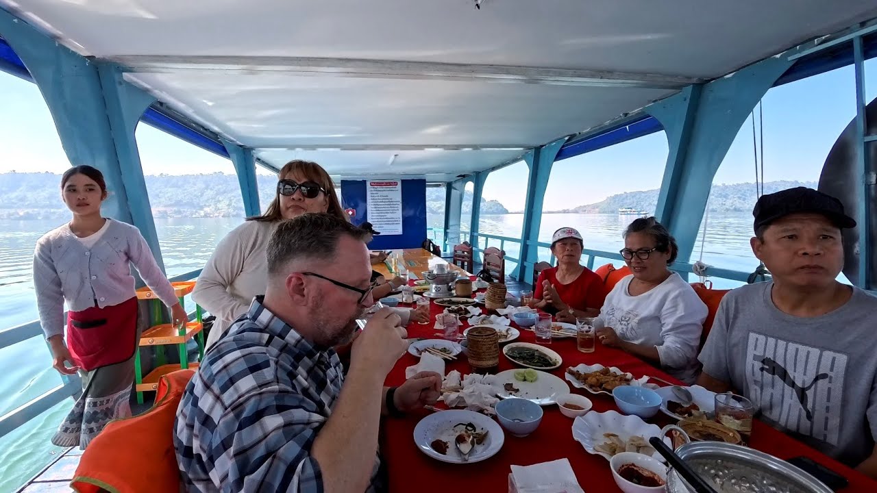 Have lunch on a floating boat restaurant and visiting the Island at Nam Ngerm, Talay Lao