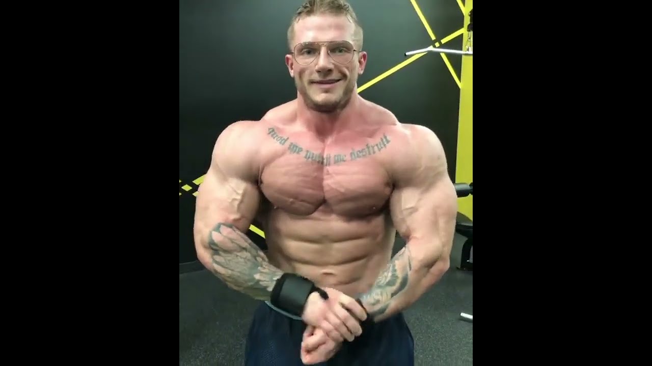 Muscle Monster Vladimir Yakovlev Flexes His Shredded Muscles.