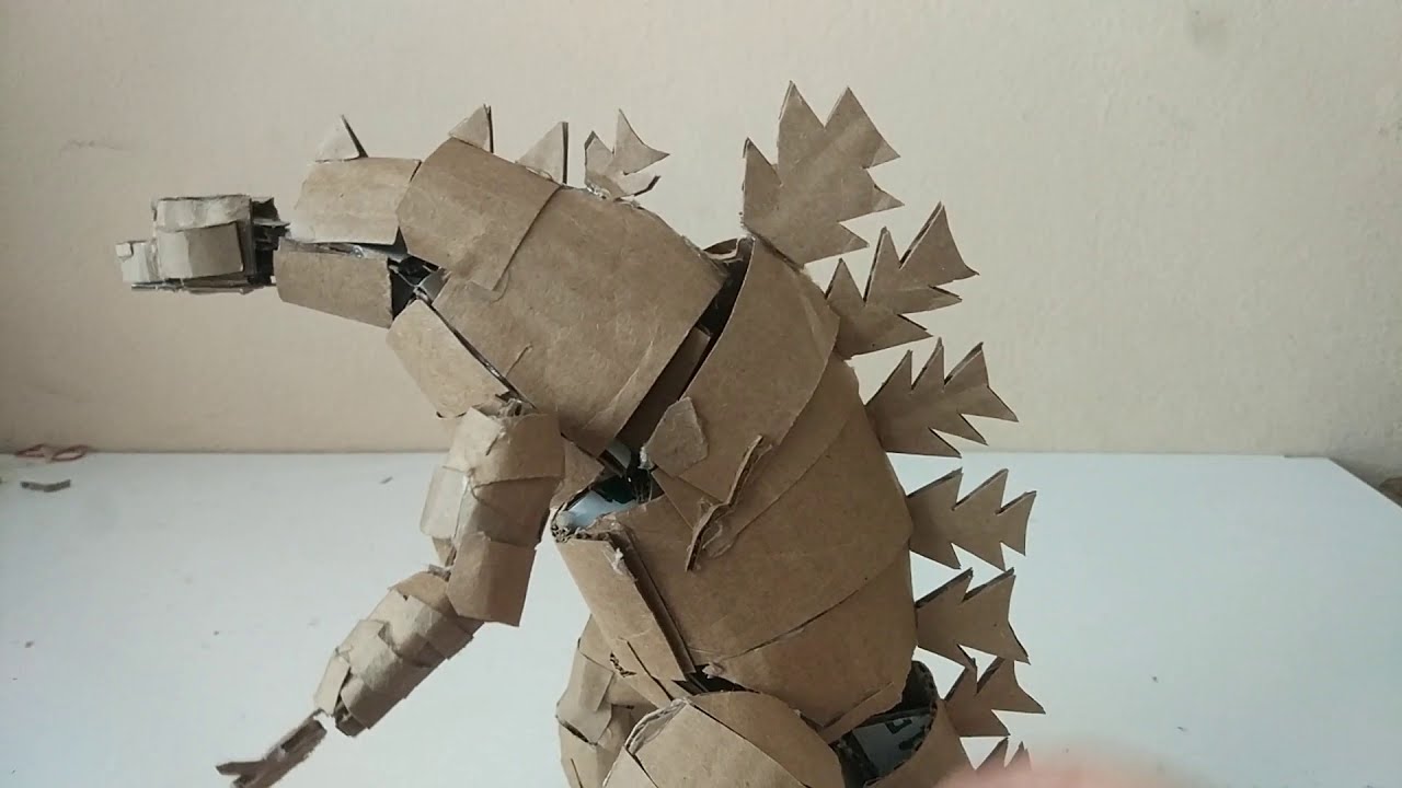 Make a cardboard Godzilla figure.