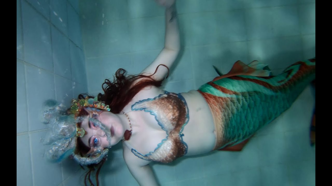 Raina Mermaid Practices Bubble Rings in Various Mermaid Costumes