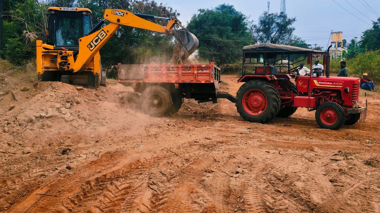 Jcb 3dx goes to loading soil with mahindra 575 and 415 tractor 