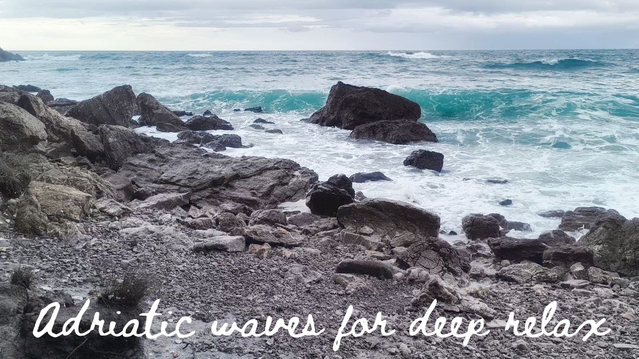 Intense Waves Crash on Stone Cliffs
